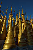 Inle Lake Myanmar. Indein, on the summit of a hill the  Shwe Inn Thein Paya a cluster of hundreds of ancient stupas. Many of them are ruined and overgrown with bushes. 